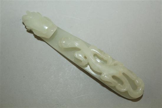 A Chinese white jade dragon belt hook, 18th / 19th century, 11.3cm